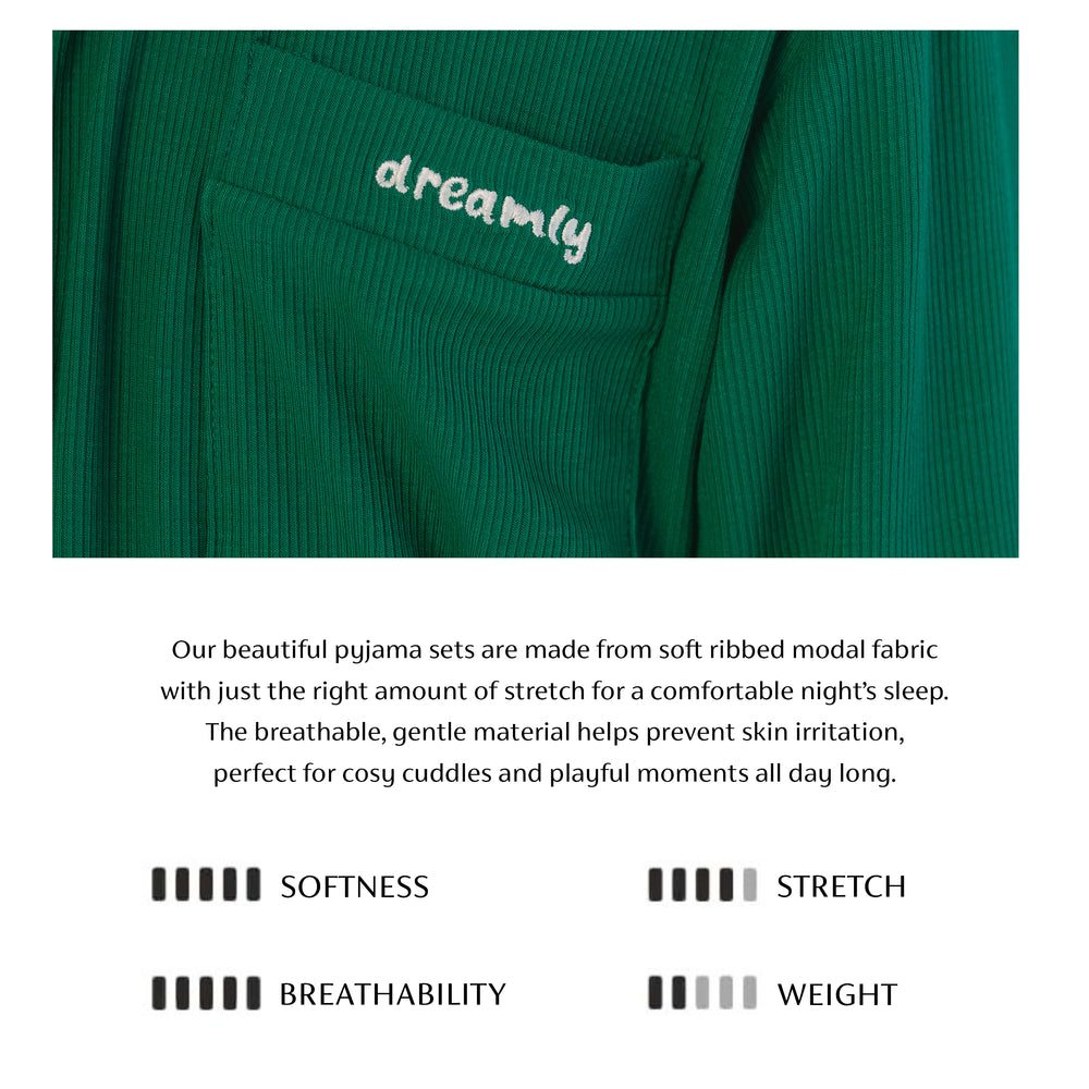 Green pajama set with 'dreamly' branding and product description text.